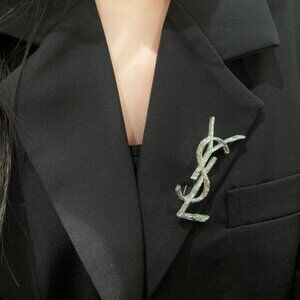 Authentic Yves Saint Laurent logo brooch